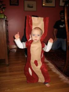 Yes...it is a bacon baby. Whoever is the owner of this child should receive a medal for best costume ever. -Bossnod-
